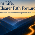 Golden path of light winding through dark blue mountains at sunrise, symbolising the PathMaker journey to learn from life and create a clearer path forward.